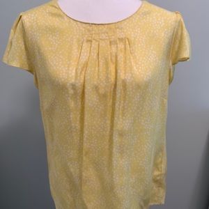 Yellow with white specks short sleeve blouse